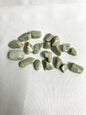 Front view of Amazonite Crystals  on a white fabric background