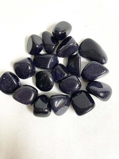 Beautiful Blue Goldstone Crystals on a white background