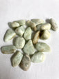 Front view of Aquamarine Crystals on a white fabric background