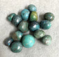 Closeup of Chrysocolla Crystals on a textured surface