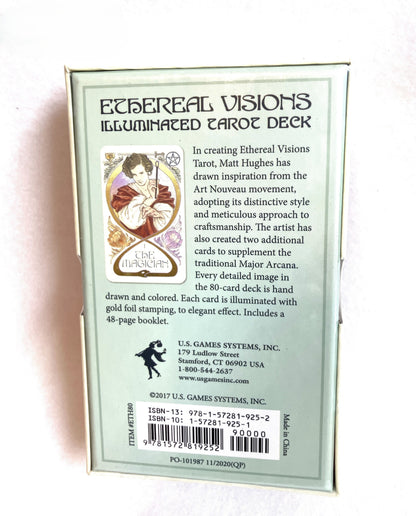 Back of a Tarot card box titled 'Ethereal Visions Illuminated Tarot Deck' with text and a barcode.
