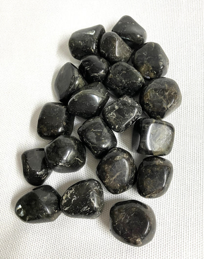 Group of Larvikite Crystals on a white fabric background
