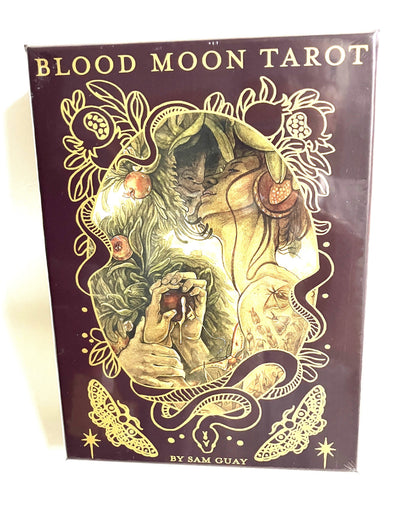 Cover of 'Blood Moon Tarot' by Sam Guay with intricate design and text.