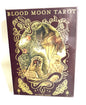 Cover of 'Blood Moon Tarot' by Sam Guay with intricate design and text.