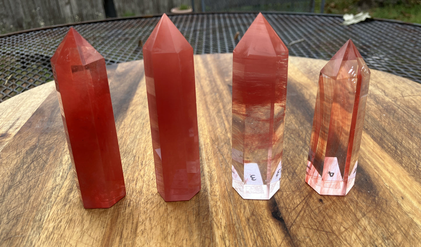 Cherry Quartz Points also known as Smelted quartz and are Man Made