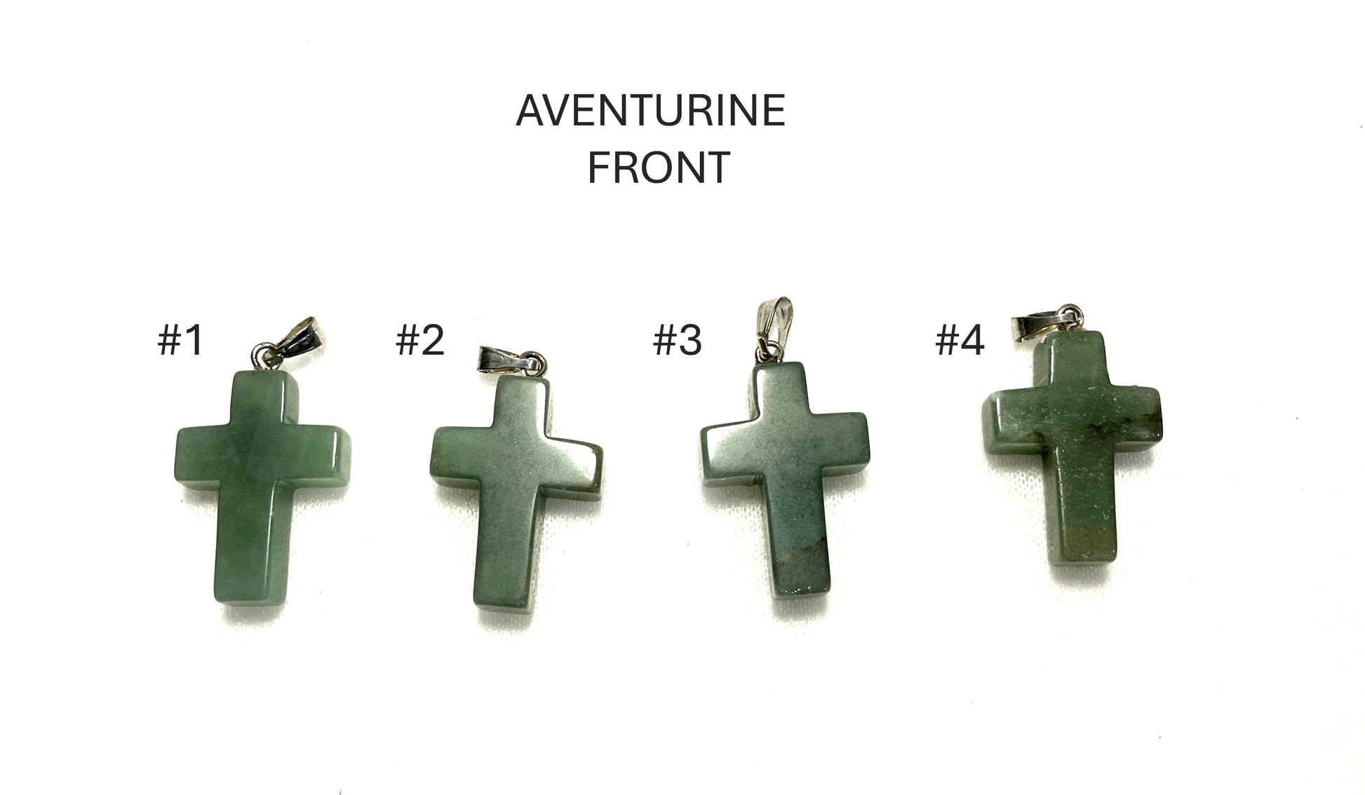 Four Green Aventurine Cross pendants labeled #1 to #4 shown on a white background.