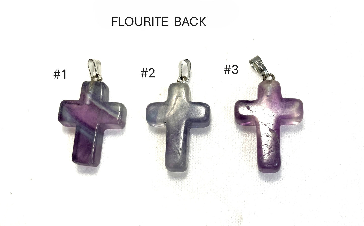 Three Flourite Cross pendants labeled '#1', '#2', and '#3' shown on a white background.