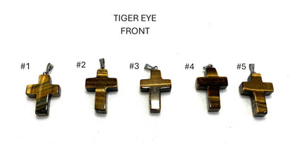Five Tiger Eye Gemstone Cross pendants shown on a white background