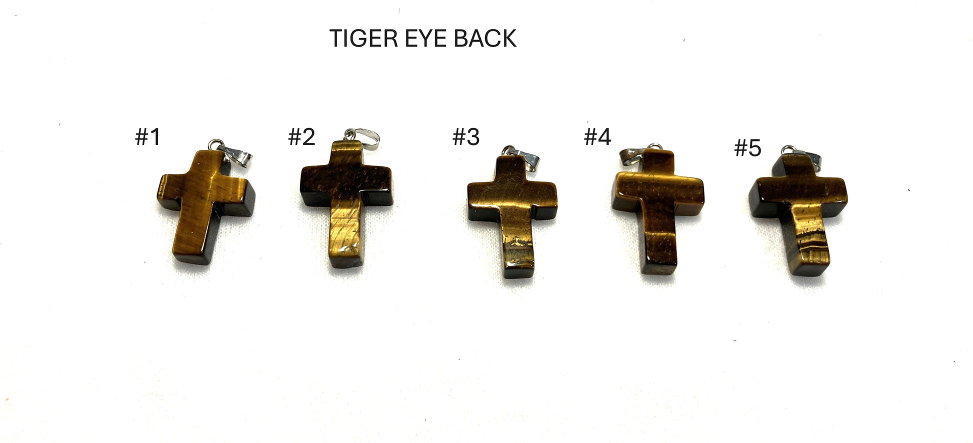 Five Tiger Eye Gemstone Cross showing backs displayed on a white background