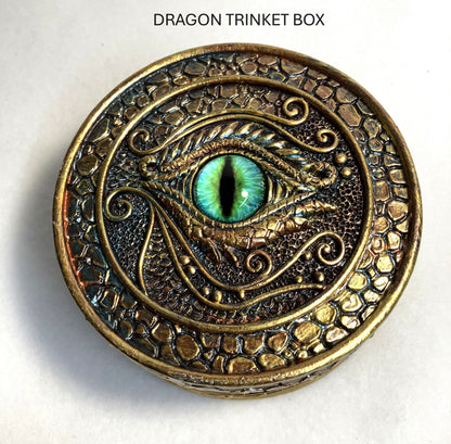 Closeup of the Dragon trinket box with green eye design shown on a white background