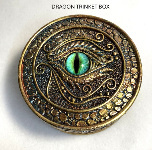 Closeup of the Dragon trinket box with green eye design shown on a white background