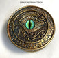 Closeup of the Dragon trinket box with green eye design shown on a white background