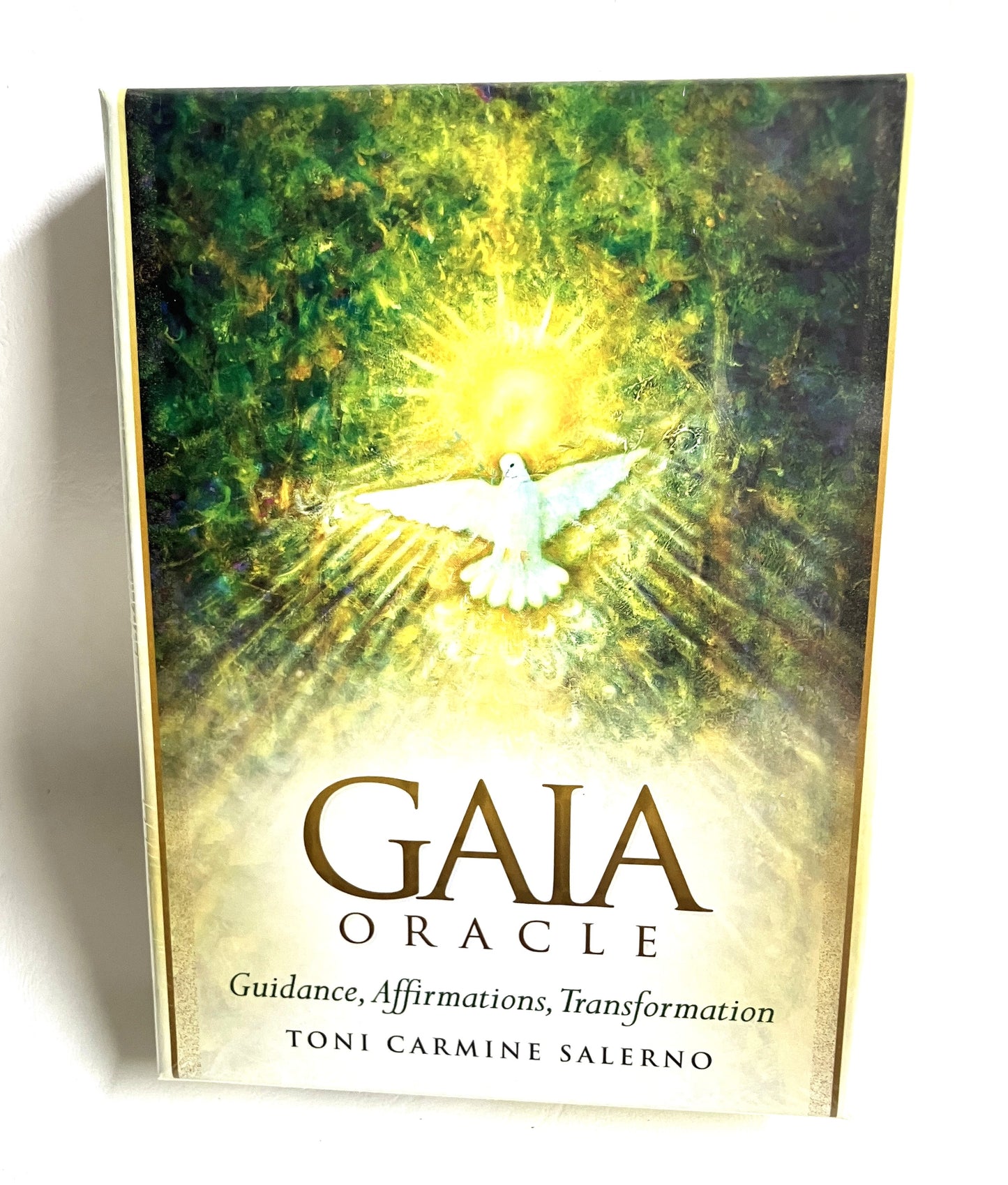 Box cover of 'Gaia Oracle' with a dove and radiant design on a green and yellow background