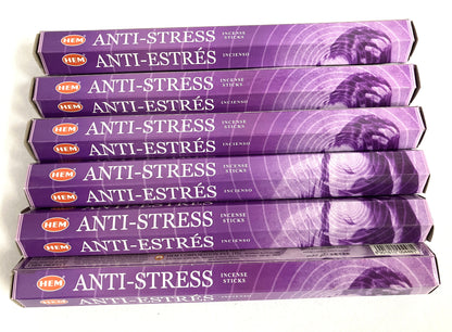 Stack of HEM Anti-Stress incense sticks packaging on a white background