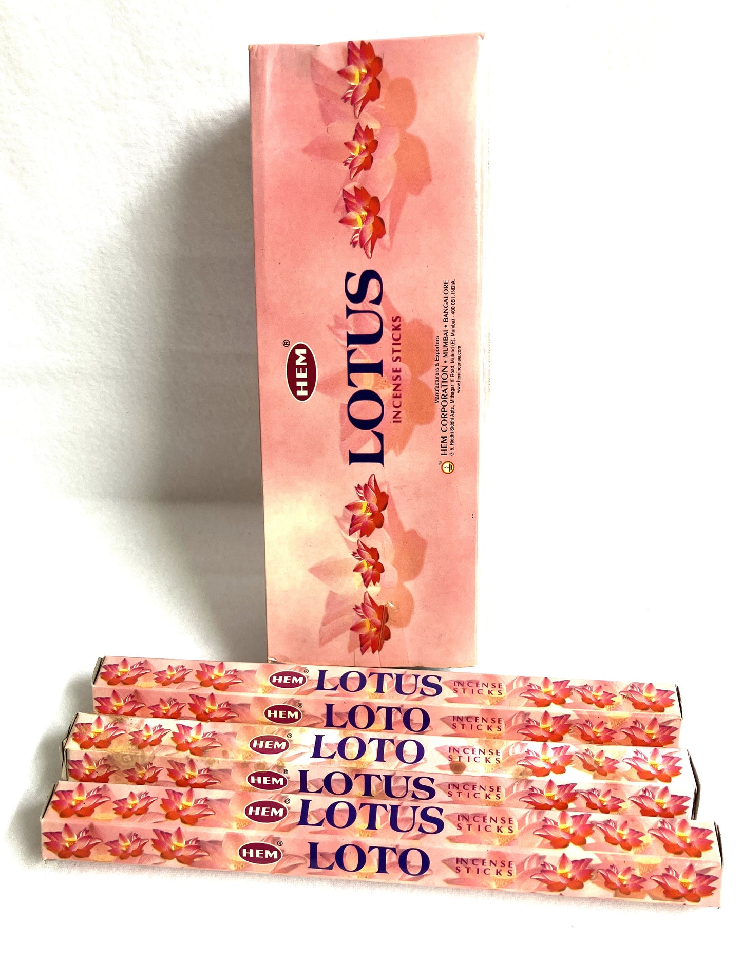 Packaging of Lotus incense sticks with a pink background