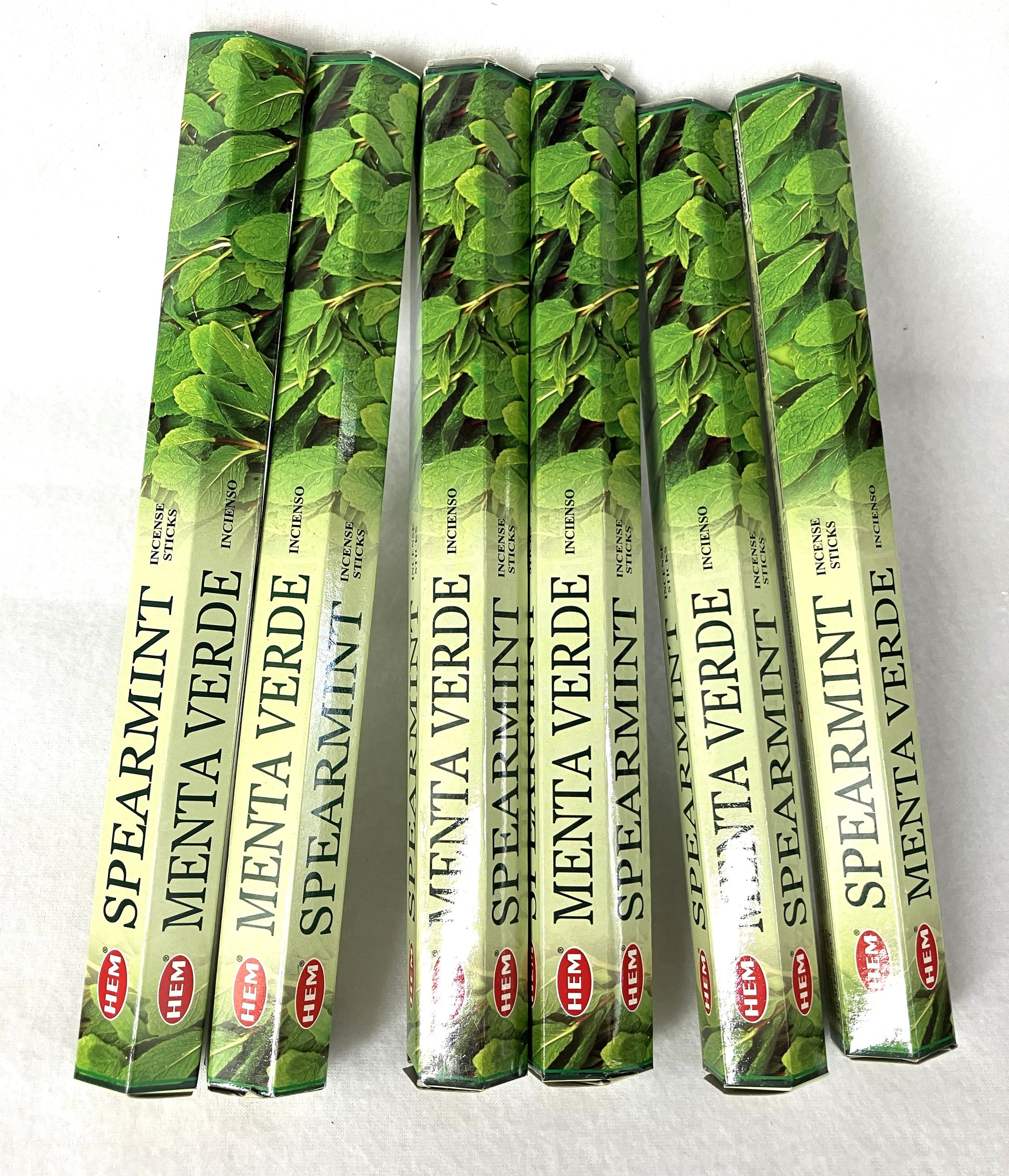 Set of Spearmint Incense sticks packaging with green leaf design in English and Spanish on a white background