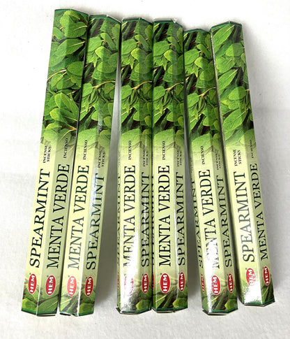 Set of Spearmint Incense sticks packaging with green leaf design in English and Spanish on a white background
