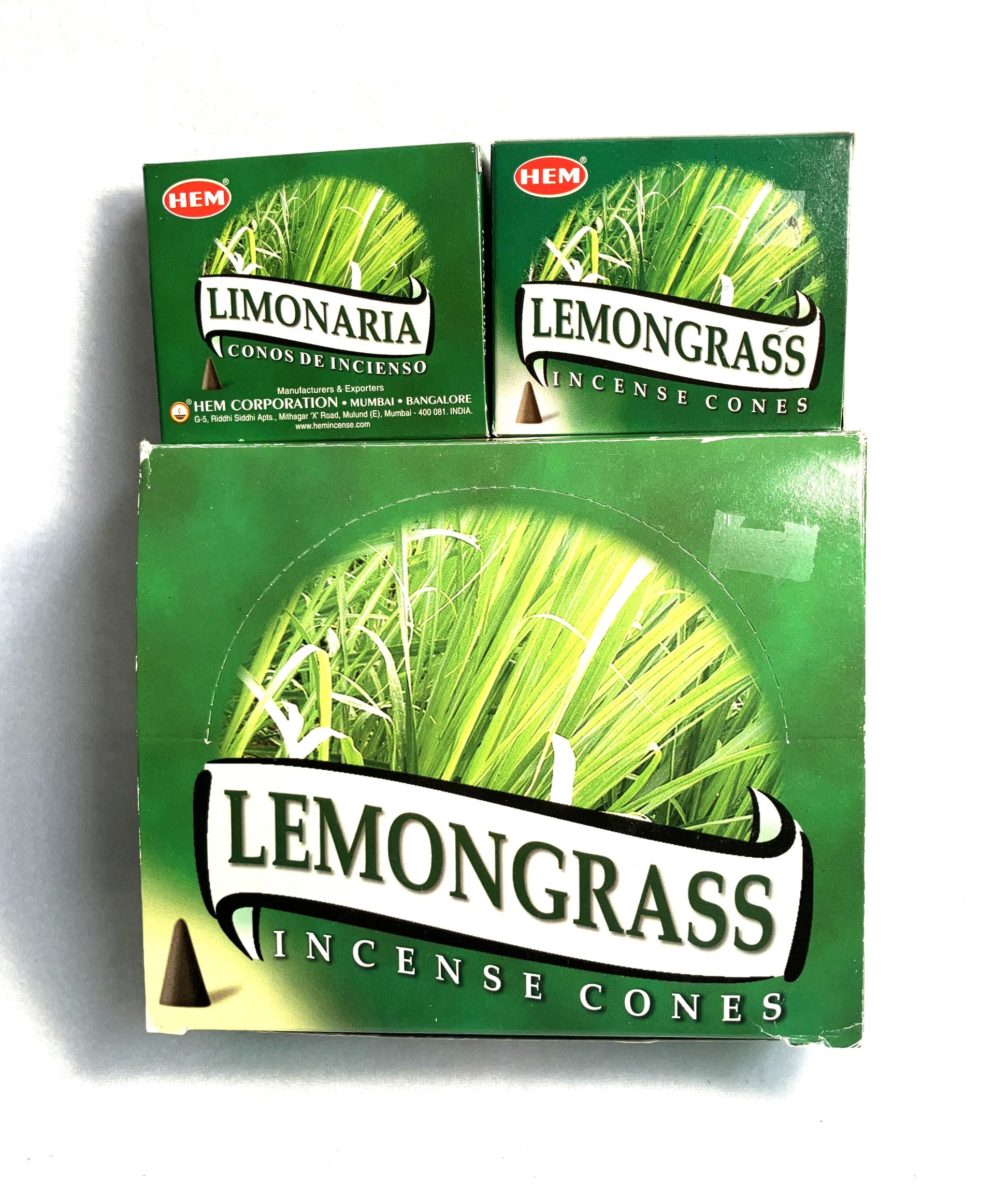 Master carton and two boxes of HEM Lemongrass incense cones shown on a white background
