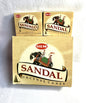 Hem Sandal incense cones with both Spanish and English titles on a white background. Individual boxes of 20 and a master carton shown