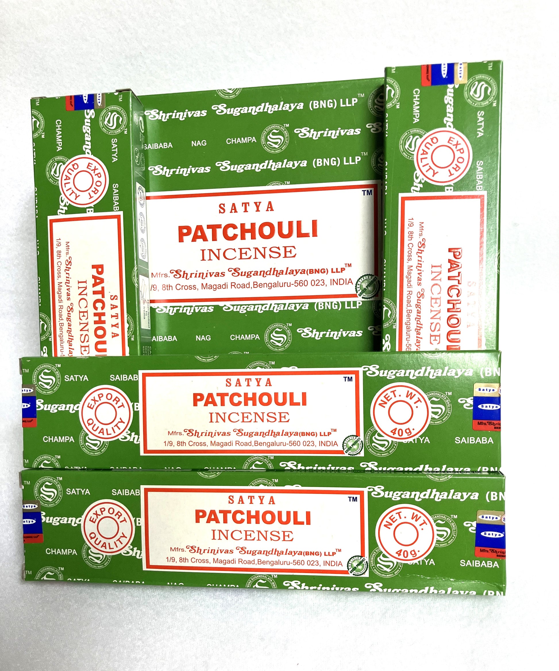 Multiple boxes of Satya Patchouli Incense on a white background