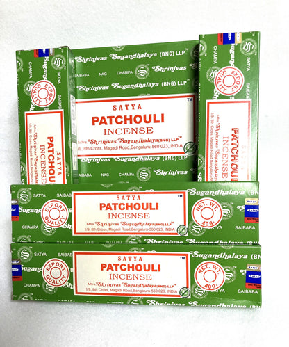 Multiple boxes of Satya Patchouli Incense on a white background