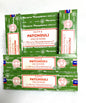 Multiple boxes of Satya Patchouli Incense on a white background