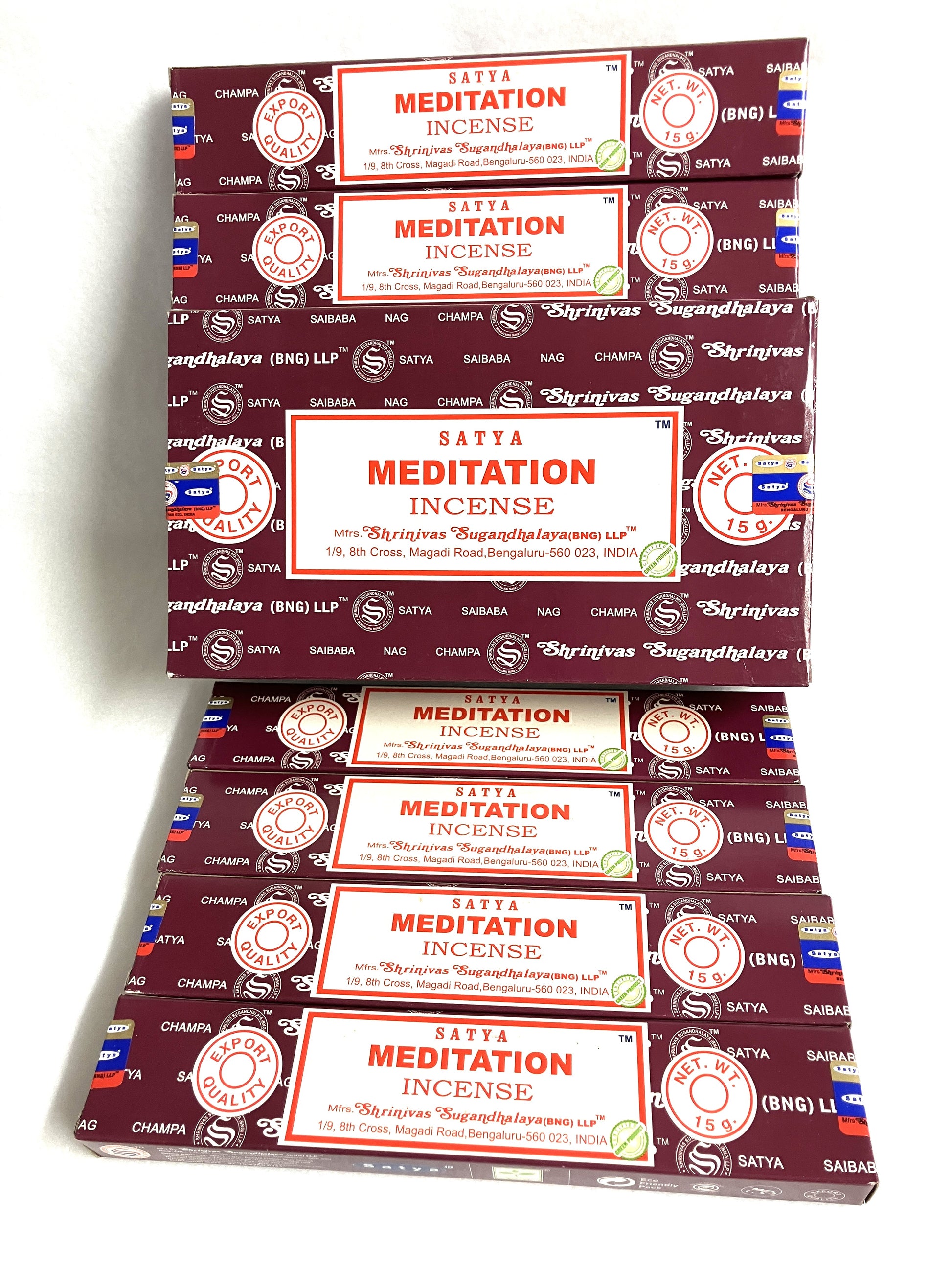 Multiple boxes of Satya Meditation Incense stacked on a white background
