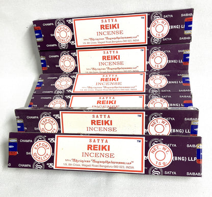 Stack of Satya Reiki Incense boxes on a white background