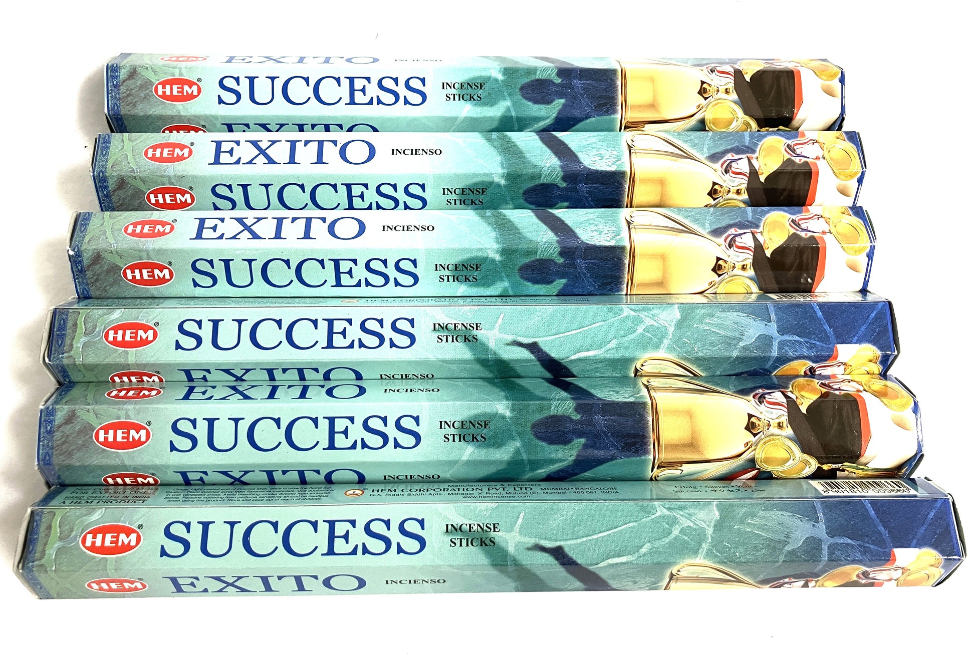 Six boxes of HEM Success Incense sticks packaging on a white background