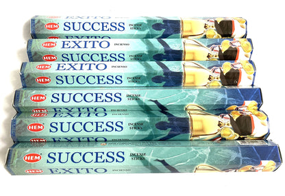 Six boxes of HEM Success Incense sticks packaging on a white background