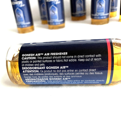 Close up of Gonesh Air air freshener bottle with label on a white background