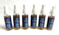 Grouping of Ganesh Air Room Freshener Spray with blue labels on a white background